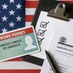Work permit in the US form with a pen right next to and checklist